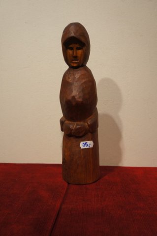 žena
