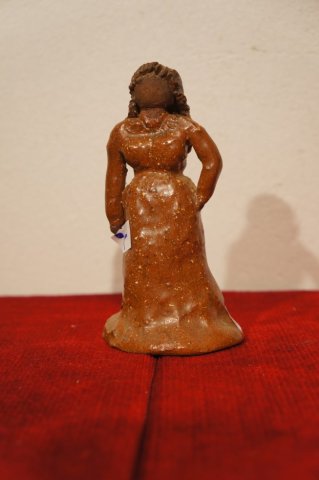 žena