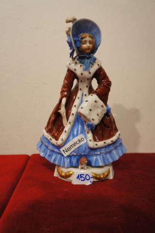 žena