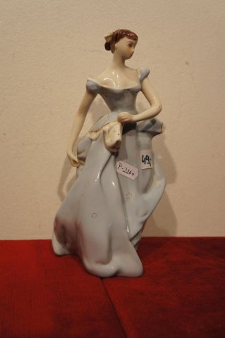 žena
