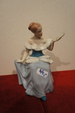 žena